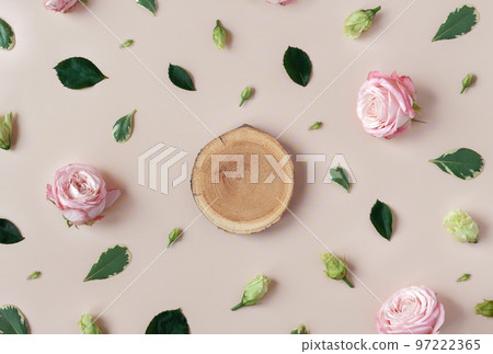Wooden podium on trendy pastel beige background with flower buds, leaves, petals. Abstract cosmetics composition backdrop with roses. Beauty layout. Summer, aroma water concept 97222365