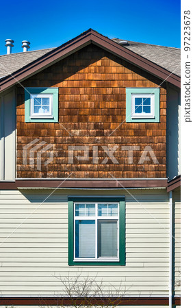 Top of residential townhouse on a bright spring day Top of residential townhouse on a bright spring day 97223678