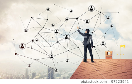 Businessman on house roof presenting networking and connection c Businessman on house roof presenting networking and connection c 97223941