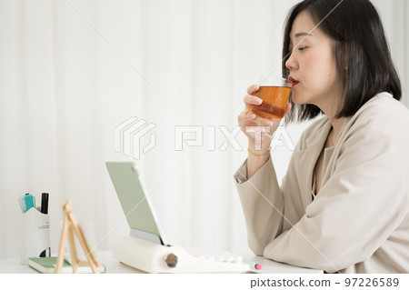 asian business and writer woman meeting online and typing by use retro keyboard and tablet 97226589