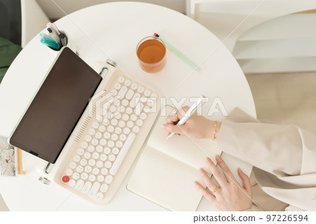 asian business and writer woman writing new her idea on book asian business and writer woman writing new her idea on book 97226594