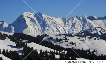 Mount Albristhore and snow covered mountains near Lenk, Switzerland. 97227414
