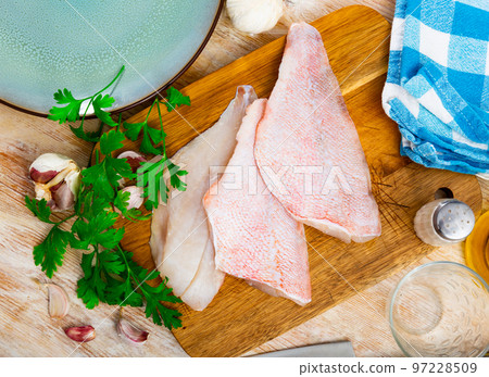 Fresh raw fillet of sea bass 97228509