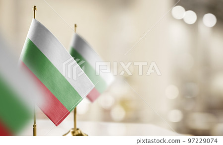 Small flags of the Bulgaria on an abstract blurry background Small flags of the Bulgaria on an abstract blurry background 97229074