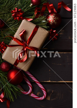 Christmass background gift boxe,red christmas tree toys,christmas decoration and spruce brance on wooden background. Christmass background gift boxe,red christmas tree toys,christmas decoration and spruce brance on wooden background. 97229863