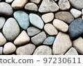 Natural grey pebble stones decorative background 97230611