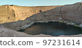 The disappearing lake located among abandoned copper quarriesin near Timna Park and kibbutz elifaz at israel is a spectacular sight in the middle of the desert 97231614
