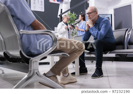 Exhausted tired senior patient waiting for medical expertise in hospital reception during checkup visit appointment. Elderly man needed to discuss health care treatment with physician doctor Exhausted tired senior patient waiting for medical expertise in hospital reception during checkup visit appointment. Elderly man needed to discuss health care treatment with physician doctor 97232190