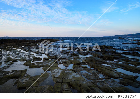 Shimoda City, Shizuoka Prefecture, Ebisu Island in the early morning, rock pavement and blue sky Shimoda City, Shizuoka Prefecture, Ebisu Island in the early morning, rock pavement and blue sky 97232754