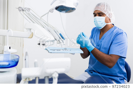 Male dentist is ready to accept client Male dentist is ready to accept client 97234023