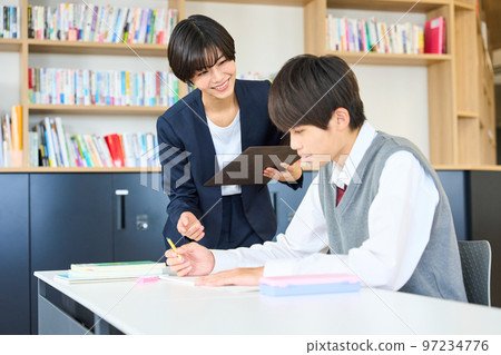 Junior high school students studying, teachers giving guidance, high school entrance exams Junior high school students studying, teachers giving guidance, high school entrance exams 97234776