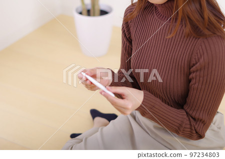woman looking at test medicine woman looking at test medicine 97234803