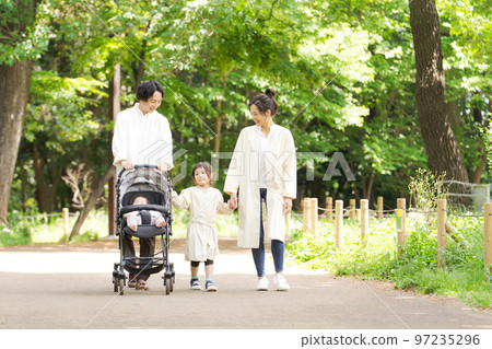 Families playing in the park 97235296