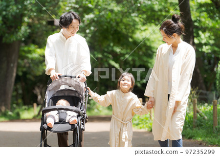 Families playing in the park 97235299