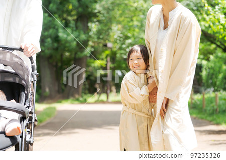 Families playing in the park 97235326