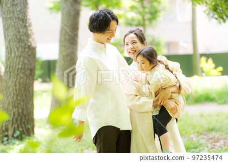 Families playing in the park Families playing in the park 97235474