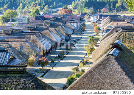 Minamiaizu-gun, Fukushima Prefecture: Ouchi-juku with traditional thatched-roof buildings seen from the observatory 97235590