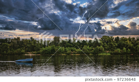 landscape empty boat on a forest lake-river under thunderclouds with lightning landscape empty boat on a forest lake-river under thunderclouds with lightning 97236648
