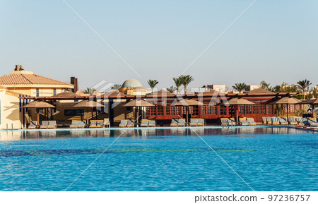 area hotel with pool and palm trees in Hurghada. Egypt. The Gol area hotel with pool and palm trees in Hurghada. Egypt. The Gol 97236757