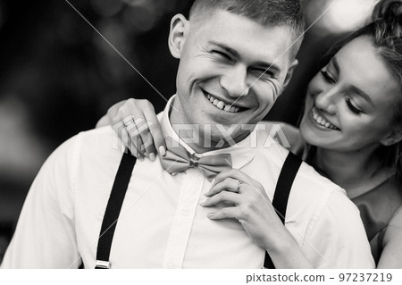 Close-up portrait of a young couple. Close-up portrait of a young couple. 97237219
