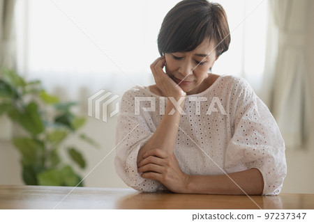 Worried Mrs. woman, headache, thinking Japanese woman image 97237347
