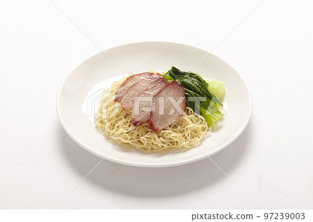 Chinese yellow egg noodles topping slice barbecue pork and boiled cabbage in a bowl Chinese yellow egg noodles topping slice barbecue pork and boiled cabbage in a bowl 97239003