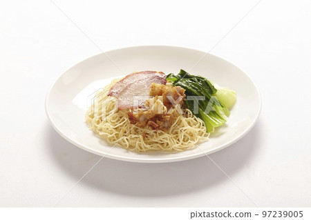 Chinese yellow egg noodles topping slice barbecue pork and boiled cabbage in a bowl Chinese yellow egg noodles topping slice barbecue pork and boiled cabbage in a bowl 97239005