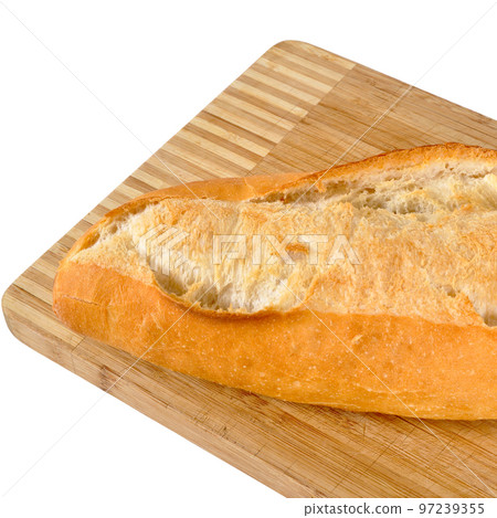 Fresh nutritious and golden colored bread, on a bamboo cutting board Fresh nutritious and golden colored bread, on a bamboo cutting board 97239355