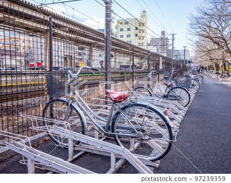 [Japan] A bicycle parked in a bicycle parking lot in front of the station in Tokyo 97239359