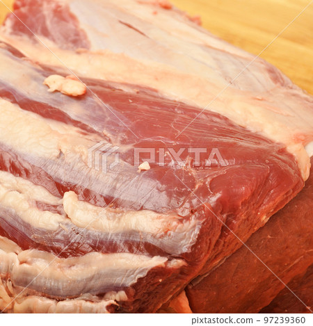 Clean very fresh red raw cow meat beef, on cutting board, cow meat texture Clean very fresh red raw cow meat beef, on cutting board, cow meat texture 97239360