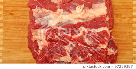 Clean very fresh red raw cow meat beef, on cutting board, cow meat texture 97239397