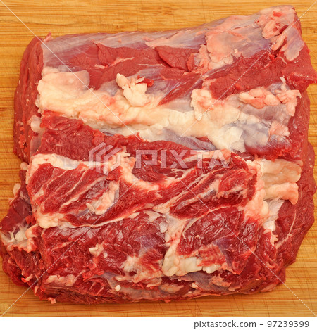 Clean very fresh red raw cow meat beef, on cutting board, cow meat texture Clean very fresh red raw cow meat beef, on cutting board, cow meat texture 97239399