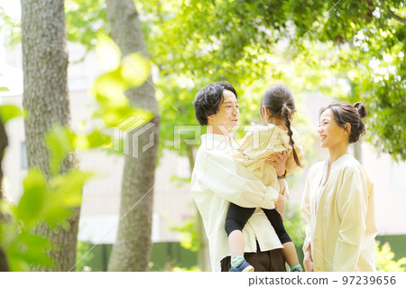 Families playing in the park 97239656