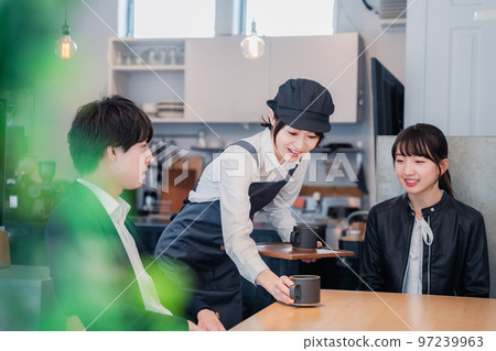 Young couple having a date in a cafe 97239963