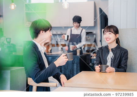 Young couple having a date in a cafe 97239985