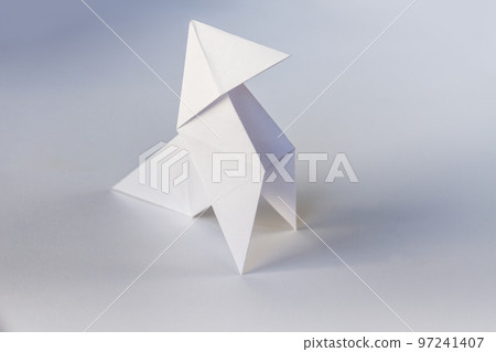 Paper hen origami isolated on a white background Paper hen origami isolated on a white background 97241407