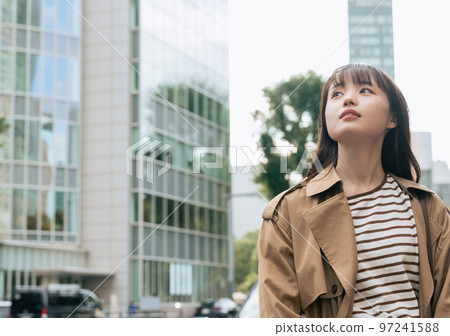 young woman walking in the city 97241588
