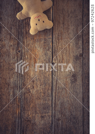 Adorable teddy bear on wooden background 97242628