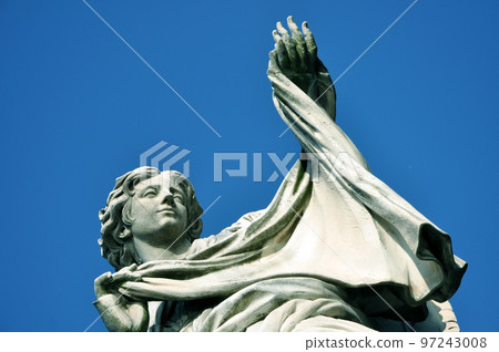 Angel statue holding the holy veil Angel statue holding the holy veil 97243008