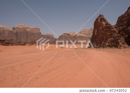Red sand dunes and sandstone cliffs Red sand dunes and sandstone cliffs 97243052
