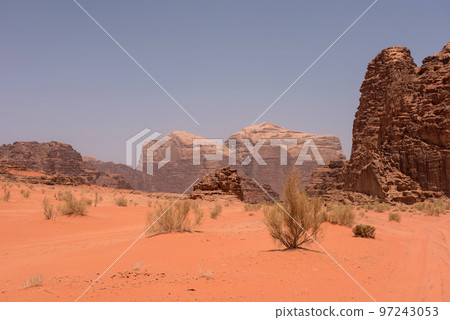 Red sand dunes and sandstone cliffs Red sand dunes and sandstone cliffs 97243053