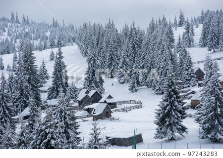 Winter mountain village landscape Winter mountain village landscape 97243283