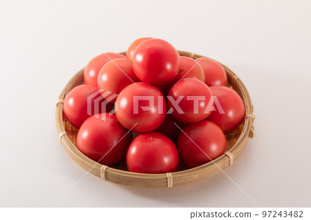 Nakadama fruit tomato served in a basket white background 97243482