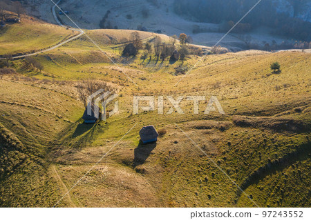 Aerial view of mountain homestead Aerial view of mountain homestead 97243552