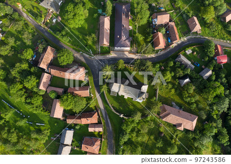 Aerial drone point of view of a whitewashed protestant church 97243586