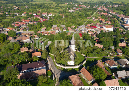 Aerial drone point of view of a whitewashed protestant church 97243730