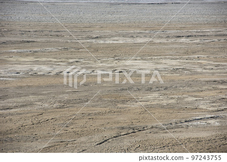Muddy waters in a decantation pond. Toxic residuals from a copper mine decating in a settling basin Muddy waters in a decantation pond. Toxic residuals from a copper mine decating in a settling basin 97243755