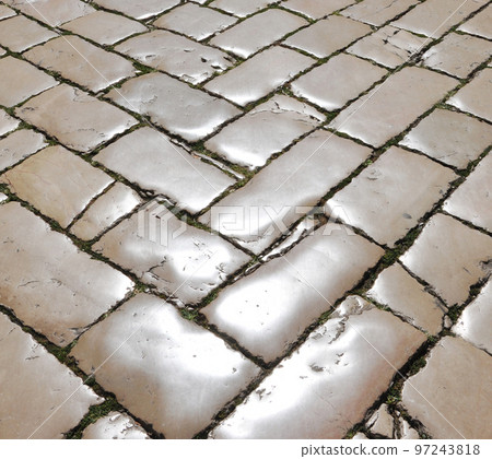 Polished street cobblestones 97243818