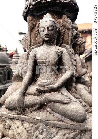 Stone statue of sitting Buddha in Swayambhunath. Nepal 97243825