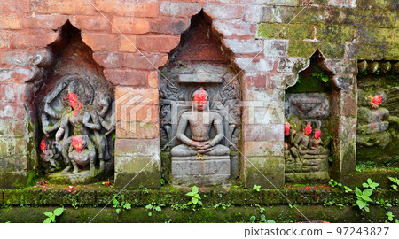 Statues of Hindu Deities on a public monument. Bhaktapur, Nepal Statues of Hindu Deities on a public monument. Bhaktapur, Nepal 97243827